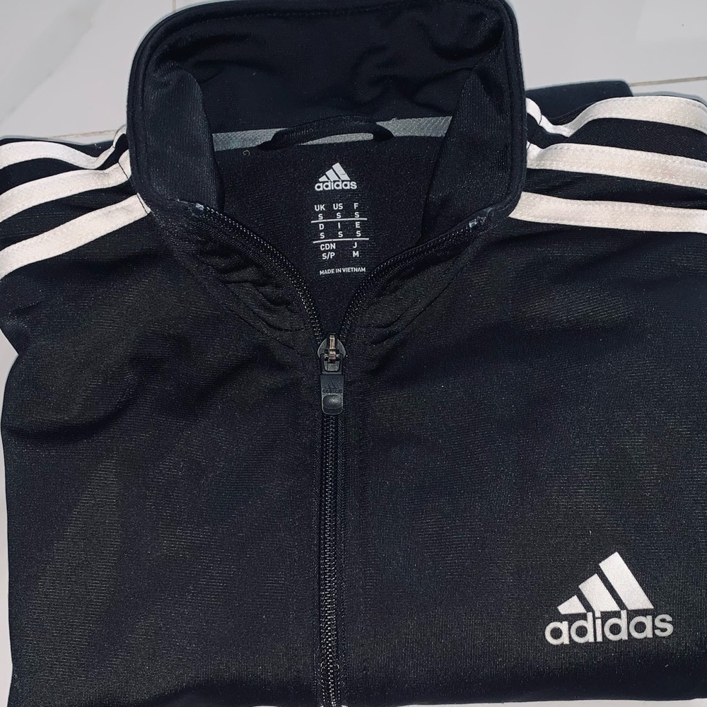 Black adidas’s full zip training jacket white strips on the arm
